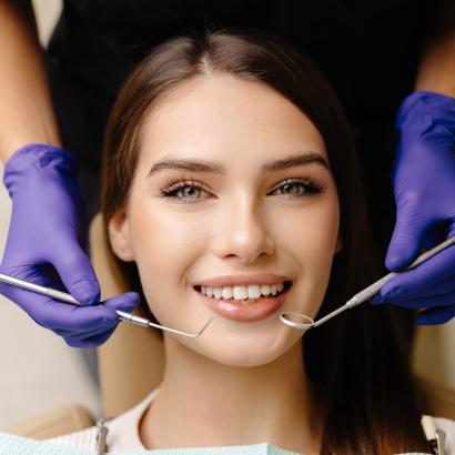 octor is checking teeth using a dental instrument, ensuring proper oral care in the clinic octor is checking teeth using a dental instrument, ensuring proper oral care in the clinic